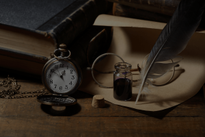 quill ink pen, vintage book, & pocket watch